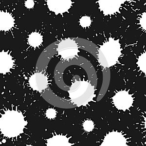 Black paint splashes on white. Seamless pattern