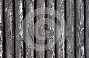 Black painted weathered wooden fence texture