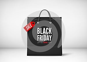 Black paper bag with tag Sale and text. Black friday banner template. Vector illustration isolated on transparent background