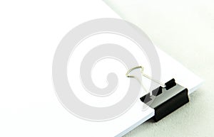 Black Paper clip isolated on white background.