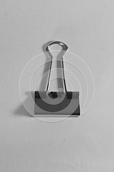 Black paper clip isolated on a white background, With clipping path