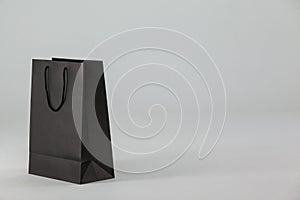 Black paper shopping bag