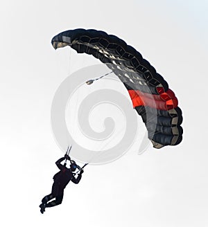 Black parachute flying