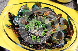 Black pasta with baked green mussel photo