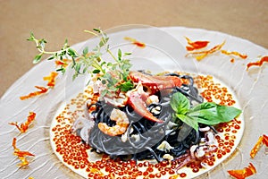 Black pasta with lobster