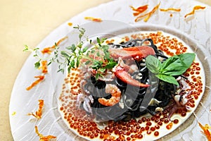 Black pasta with lobster