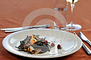 Black pasta with seafood meal