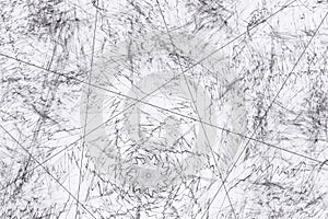 Black pattern of curved waves and lines on a white background.