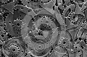 Black pattern of linked hermetical machine scrap