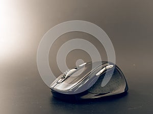 Black pc mouse wireless on black background