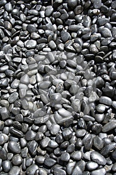 Black pebbles background