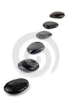 Black pebbles in a row