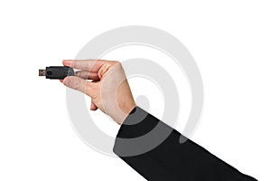 Black pen drive on hand with isolated white background