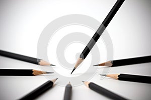 Black pencil standing out from crowd of plenty identical black fellows. business success concept.