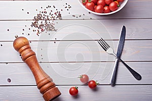 Black pepper corns and Black pepper Powder on wooden background