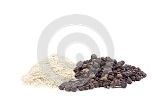 Black pepper corns scattered on white background and Black pepper Powder