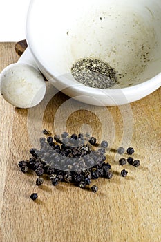 The black pepper ground in a mortar