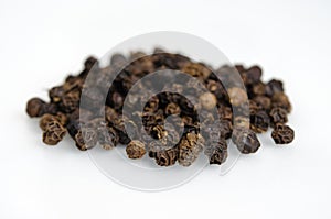 Black pepper, piper nigrum, isolated on white background