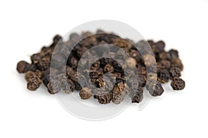 Black pepper, piper nigrum, isolated on white background