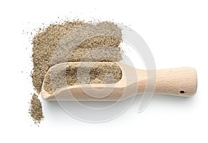 Black Pepper Powder On Wooden Scoop Isolated