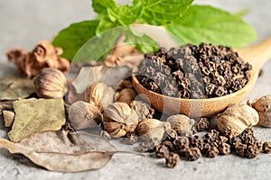 Black pepper and siam cardamom, Amomum krervanh Pierre, Asia dried spices herb for drug and Thai cooking for good health