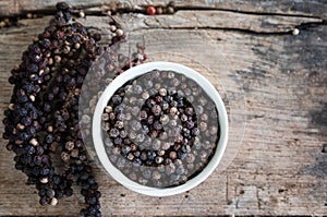 Black pepper on wood table,spices for food.