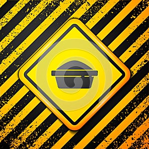 Black Pet food bowl for cat or dog icon isolated on yellow background. Dog or cat paw print. Warning sign. Vector