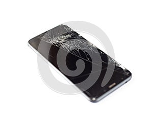 Black phone with a broken sensor and screen, cracked touchscreen glass on a white background isloate