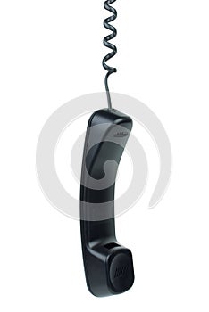 Black phone handset hanging on cord