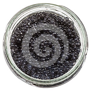 Black pickled caviar of halibut fish in glass jar