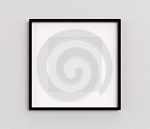 Black picture frame square shape on white wall. Blank Mockup