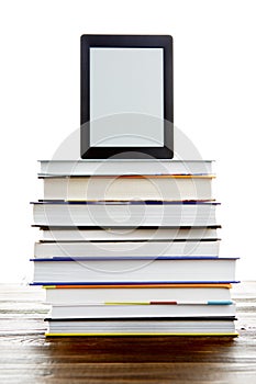 Black picture frame on stack of books