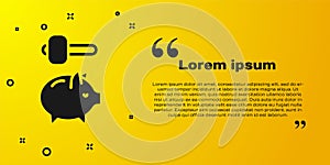 Black Piggy bank and hammer icon isolated on yellow background. Icon saving or accumulation of money, investment. Vector