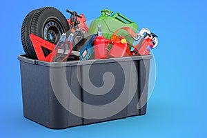 Black plastic box full of car tools, equipment and accessories on blue background, 3D rendering