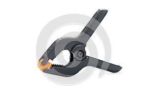 Black plastic clamp isolated on white background with clipping path