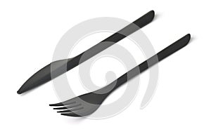 Black plastic disposable fork and knife