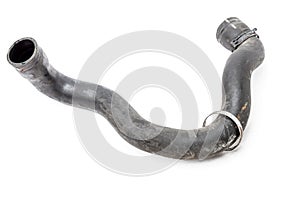 Black plastic engine cooling radiator hose on white isolated background in a photography studio for sale at auto-parsing or for