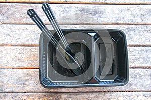 Black plastic food container