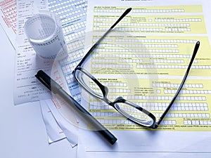 black plastic frame on the table with a declaration form.  office, finance, business and taxes.