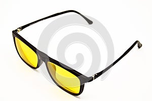 Black plastic frame yellow lens glasses, glasses isolated on white background