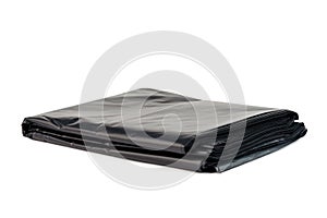 Black plastic garbage bags on white background