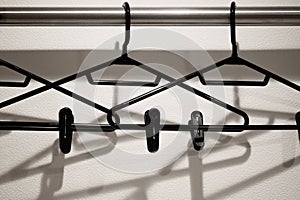 Black hangers on a rod