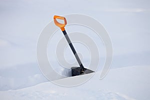 Black plastic shovel for snow removal