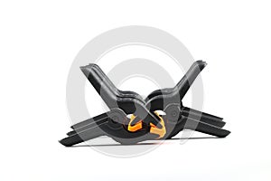 black plastic spring clamp isolated over white background