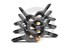 black plastic spring clamp isolated over white background