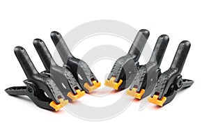 black plastic spring clamp isolated over white background