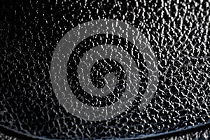 Black plastic texture useful as background