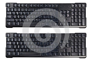 Black plastic wireless computer keyboards with symbols and without isolated on white background