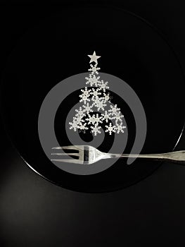 Black plate for after Christmas, concept of excess stimuli photo