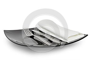 Black plate knife fork and a napkin